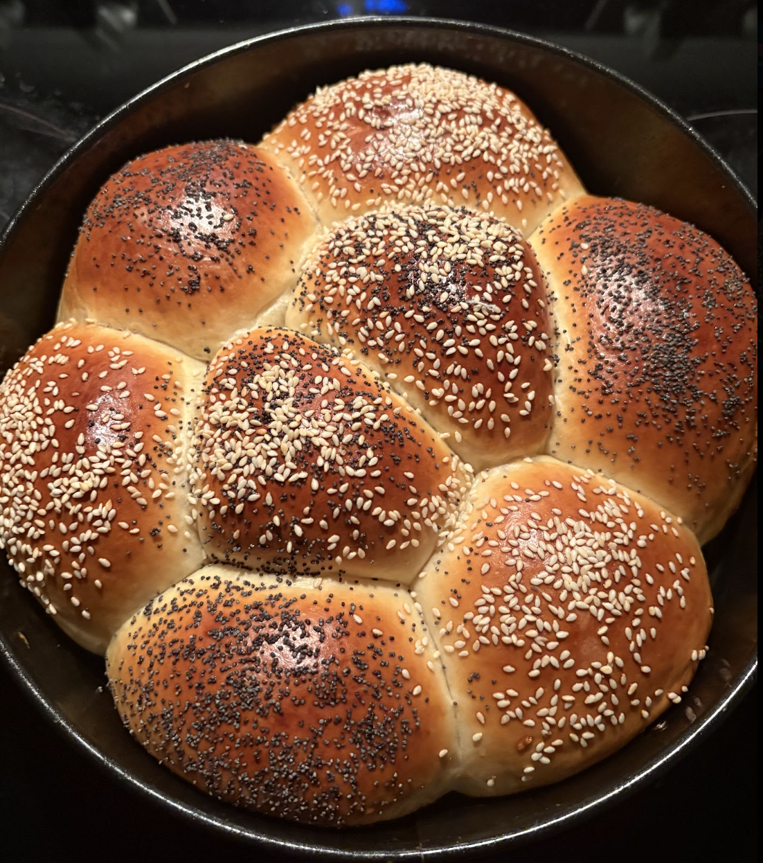 Pan of homemade sesame and poppy seed rolls